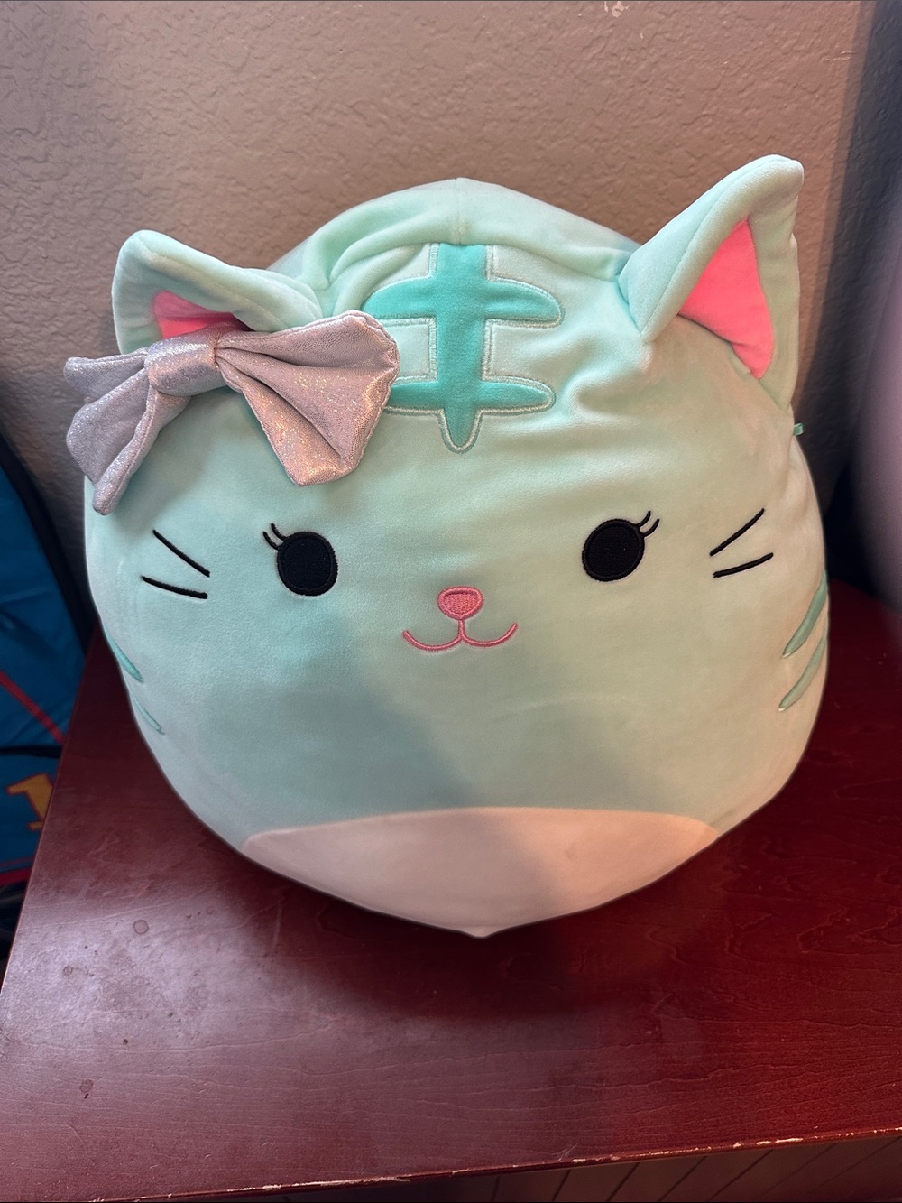 Squishmallows Mint Cat Plush Pillow with Pink Accents